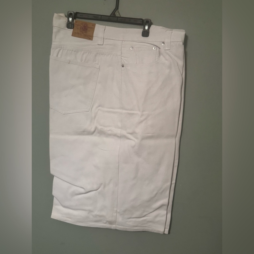 White Jean Shorts with Raw Hem and Mid-Thigh Length